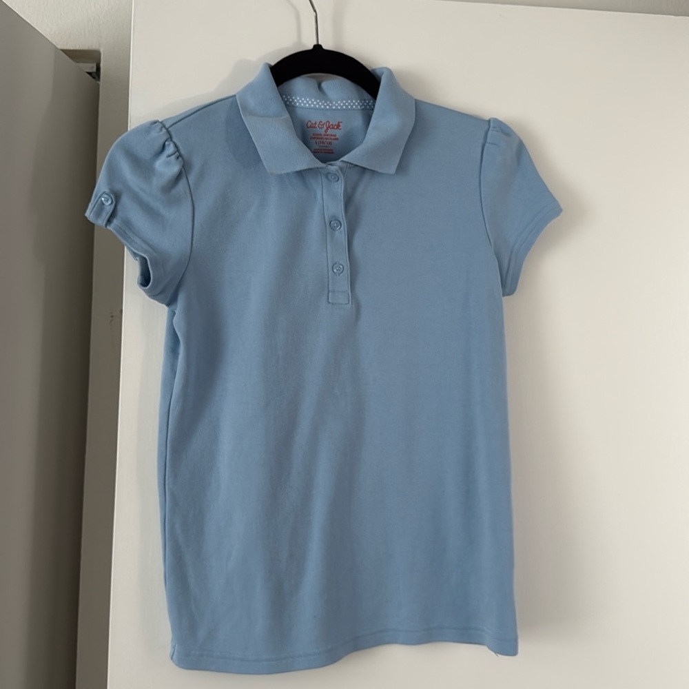 Cat & Jack Navy Kids Polo Shirt
Size 10-12 Uniform
NWT never worn